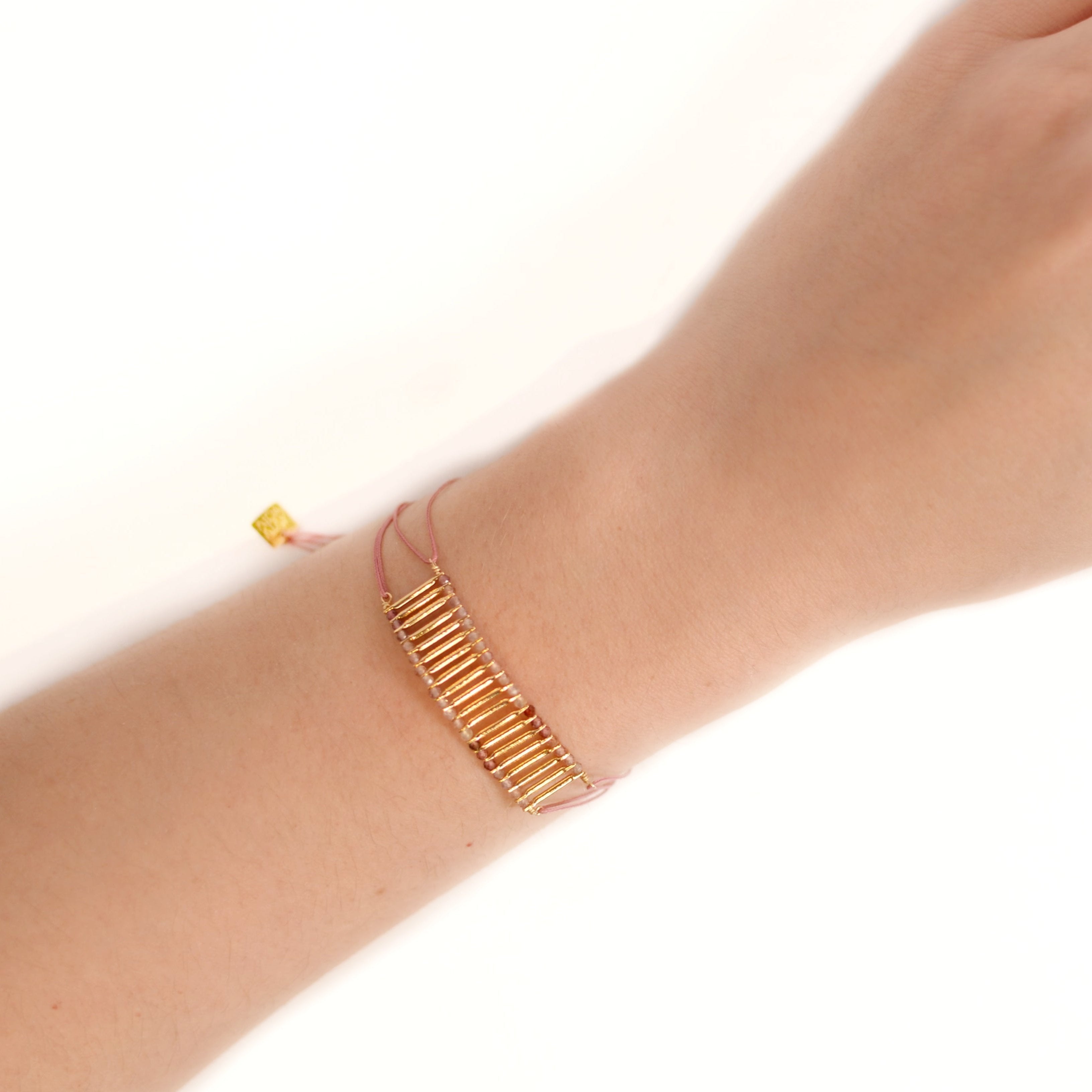 Spin cord bracelet